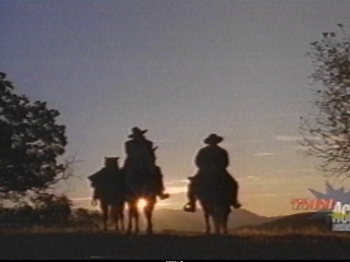 Buck and Nathan riding to meeting the prisoners